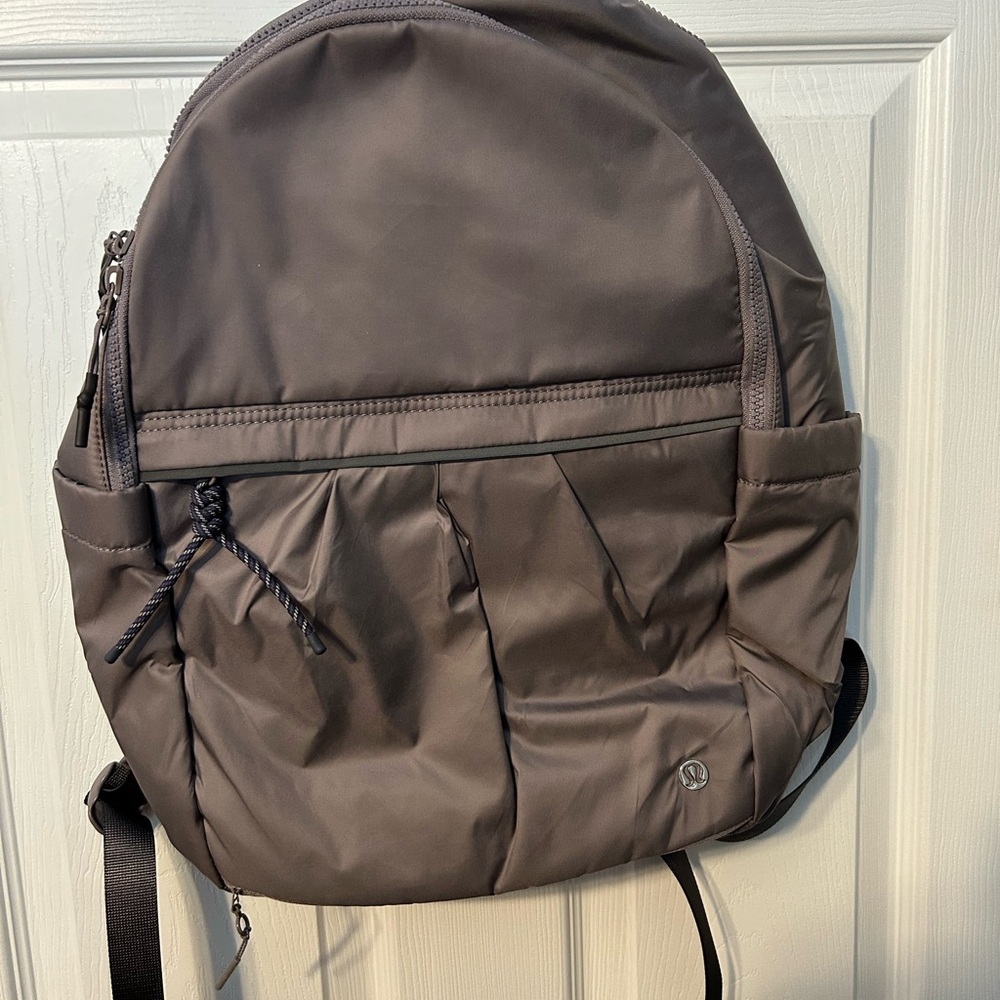 Lilac colour pack it up backpack- NWT!